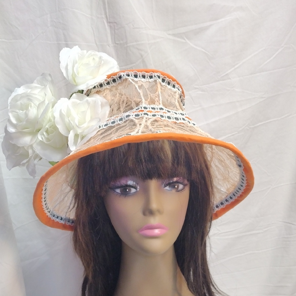 Chic Women's Hat with Orange Trim and White Floral Accents